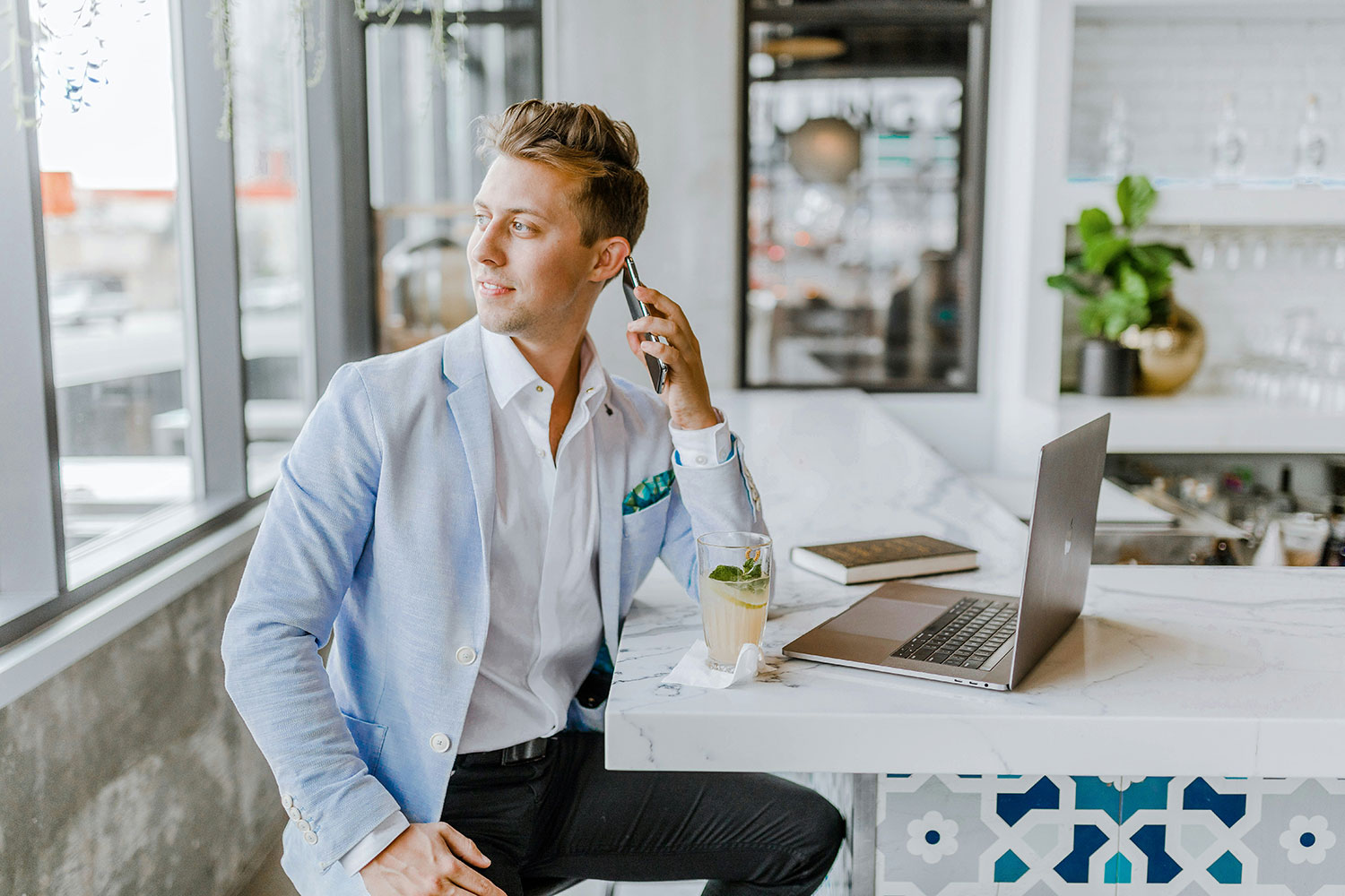 Solo entrepreneur managing their schedule with simple booking software
